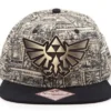 GORRA DE BEISBOL THE LEGEND OF ZELDA: LOGO EN CHAPA METALICA (COLOR OCRE ESTAMPADO)