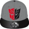 GORRA DE BEISBOL TRANSFORMERS: LOGO AUTOBOTS Y DECEPTICONS (COLOR GRIS)
